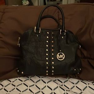 Michael Kors black leather purse.